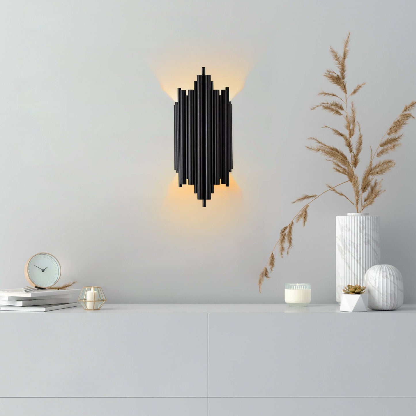 Modern black ribbed column wall light fixture adding texture and interest to any wall.