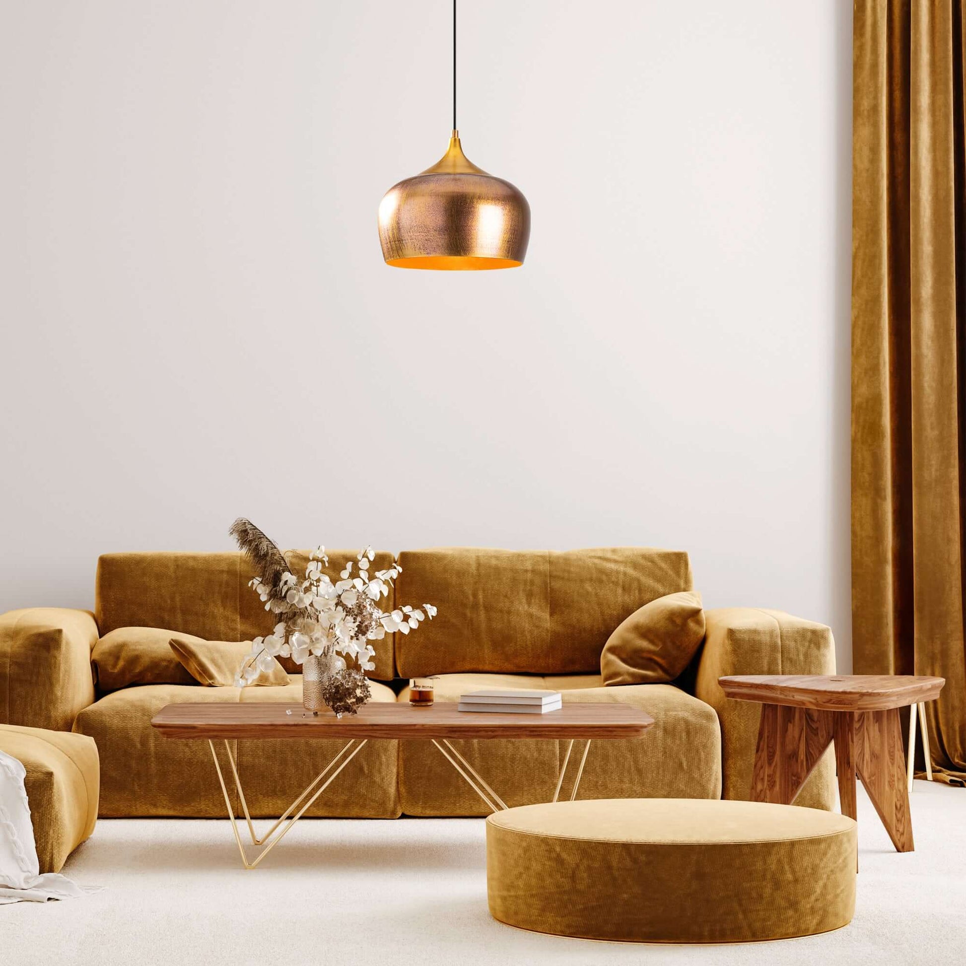 Brushed gold dome pendant light fixture with warm glow and luxurious design.