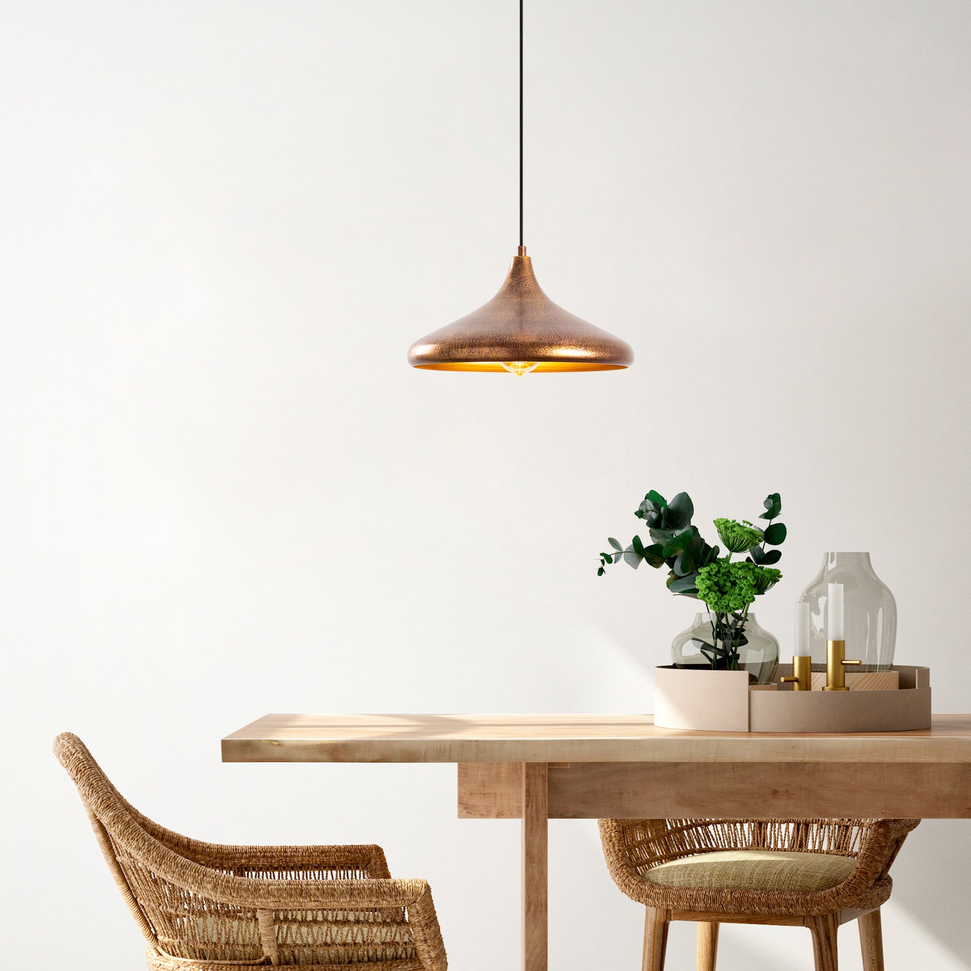 Golden Drop Pendant Light Over a Dining Table