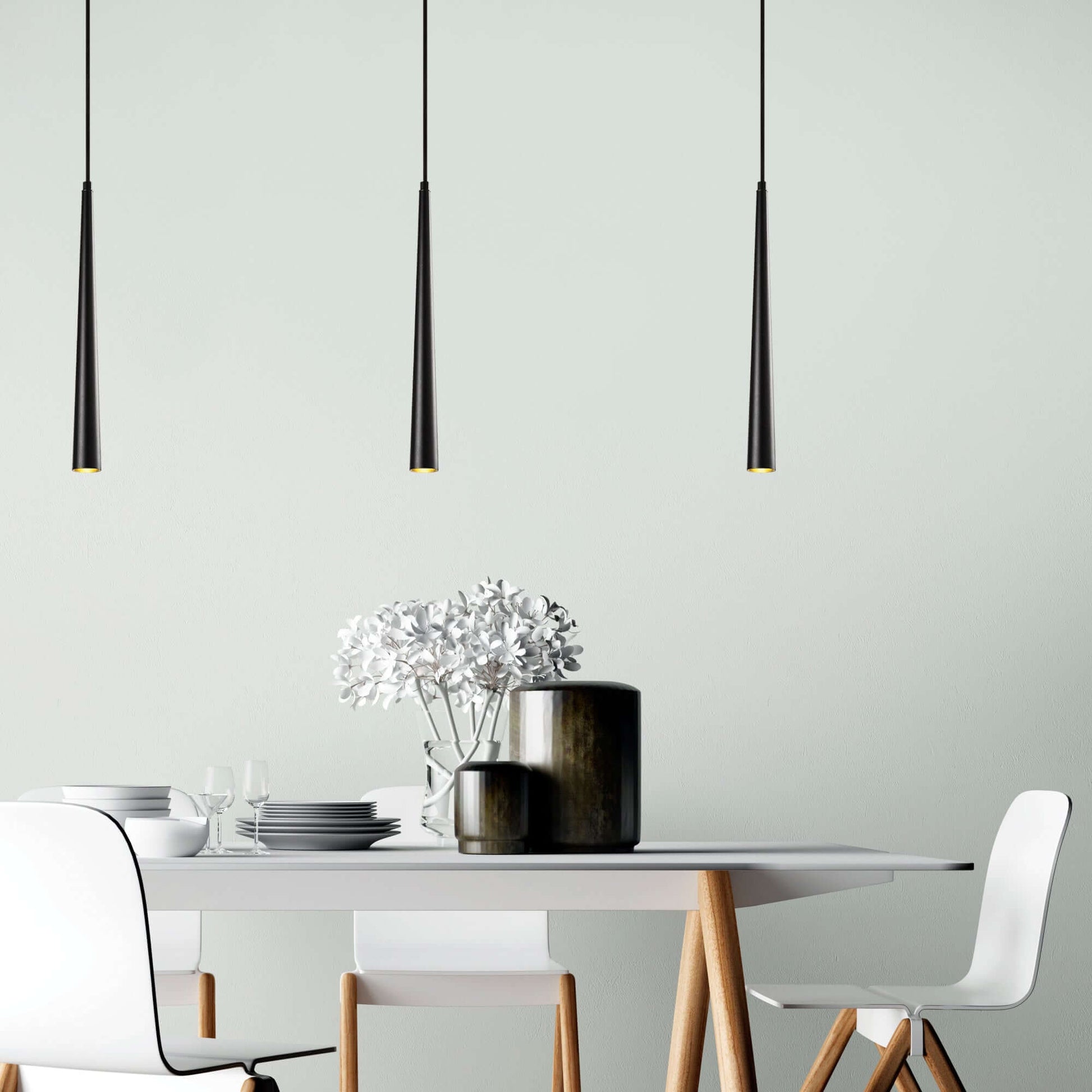 Sleek black tapered pendant light for focused kitchen island lighting.