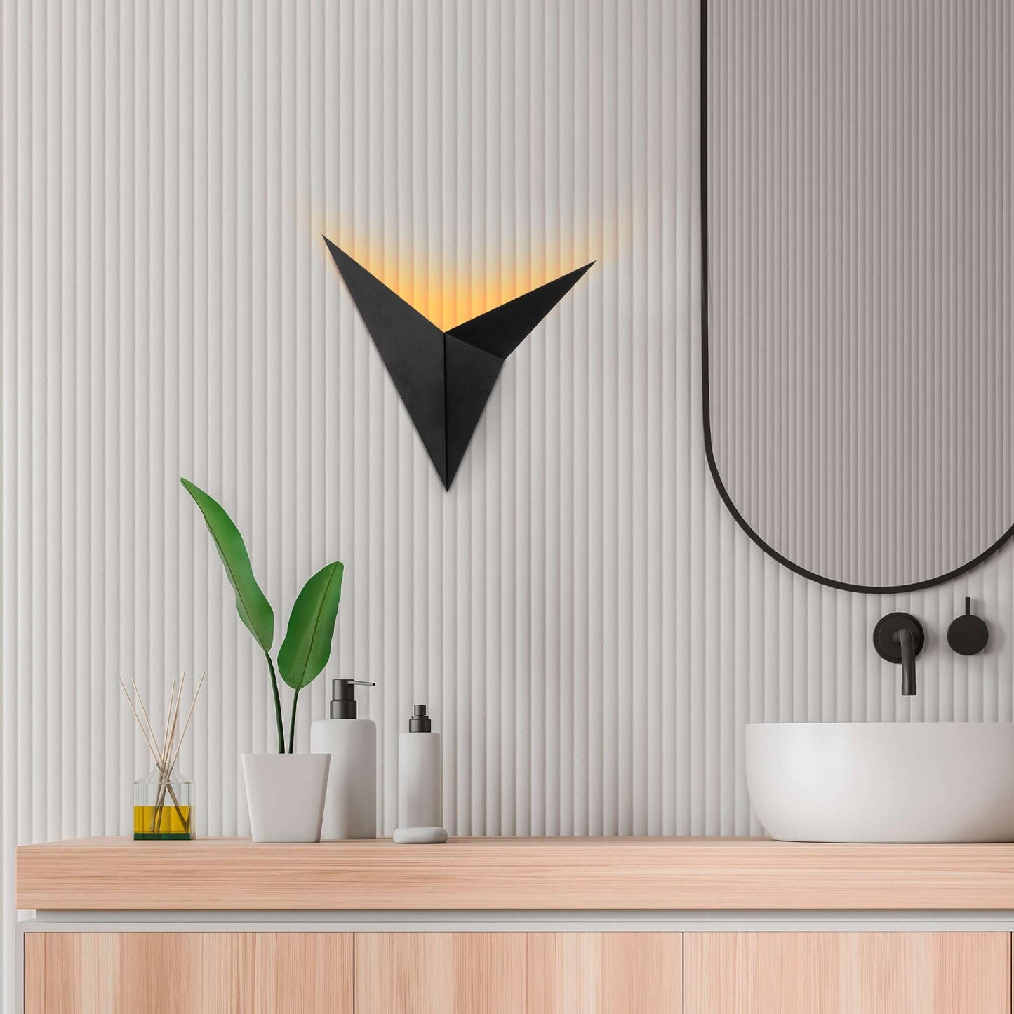 Triangular black geometric wall light fixture for modern rooms.