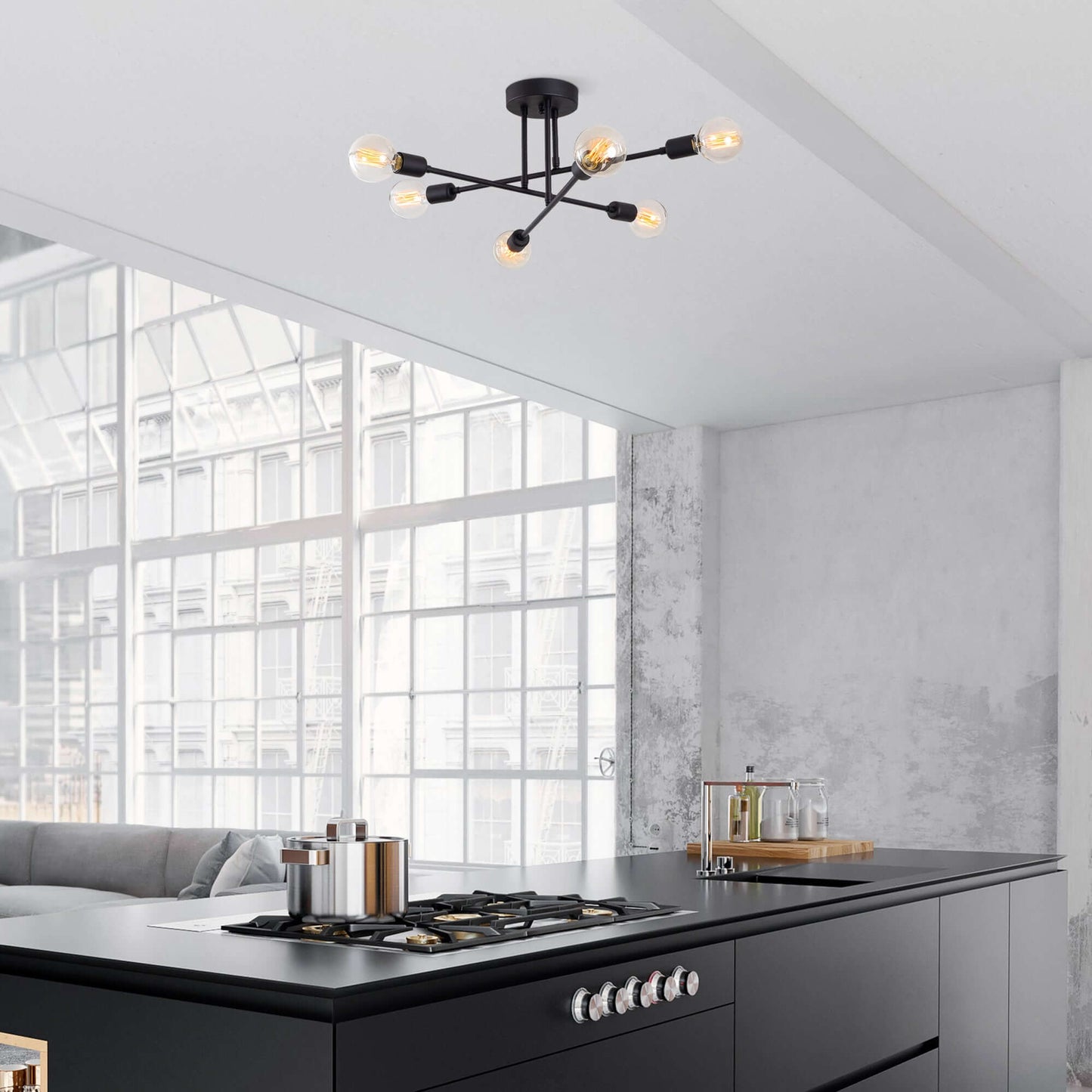 Atomic Branch Chandelier Black with six exposed bulbs on sleek black frame in starburst design.