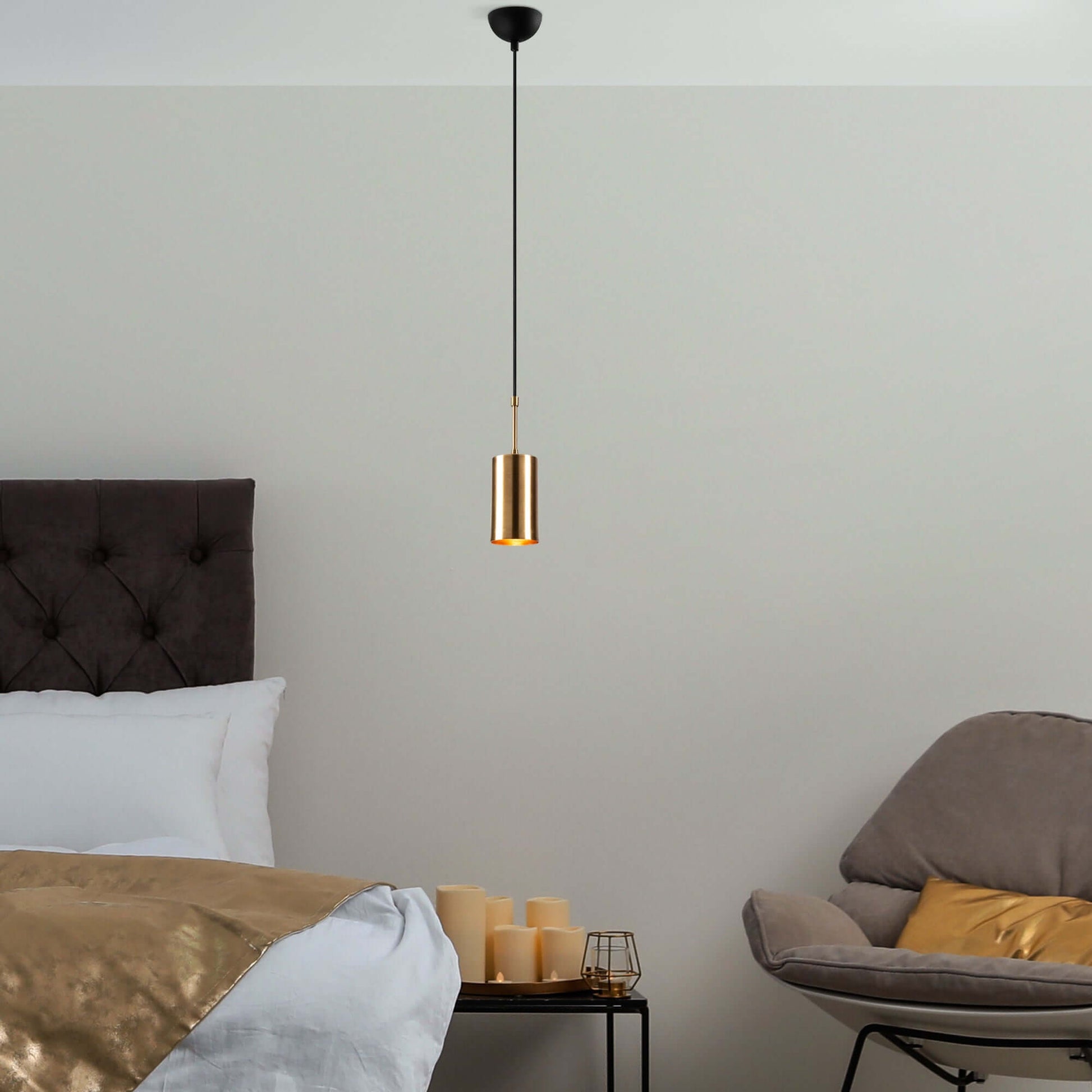 Aurora Cylinder Solo gold finish modern light fixture with warm glow.