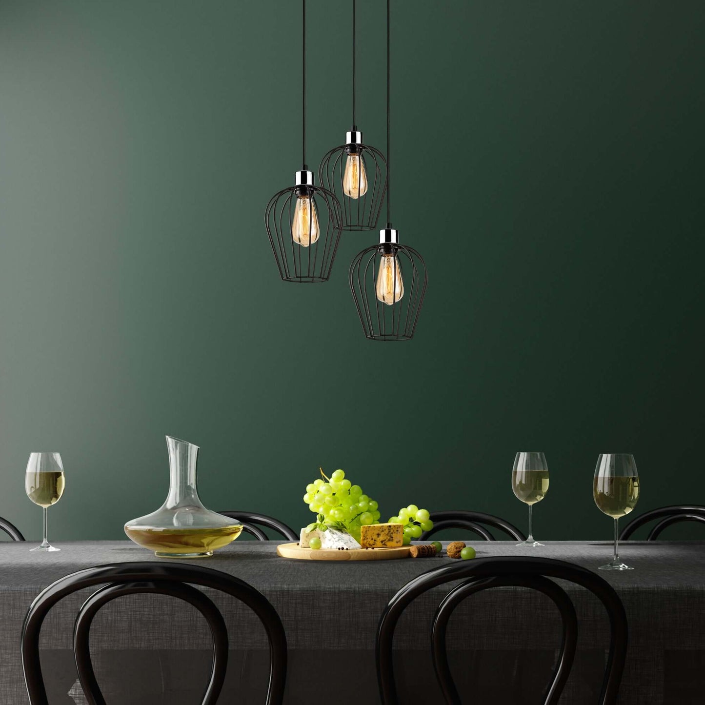 Cage Trio Pendant with three cage-like shades showcasing bulbs for modern industrial decor.