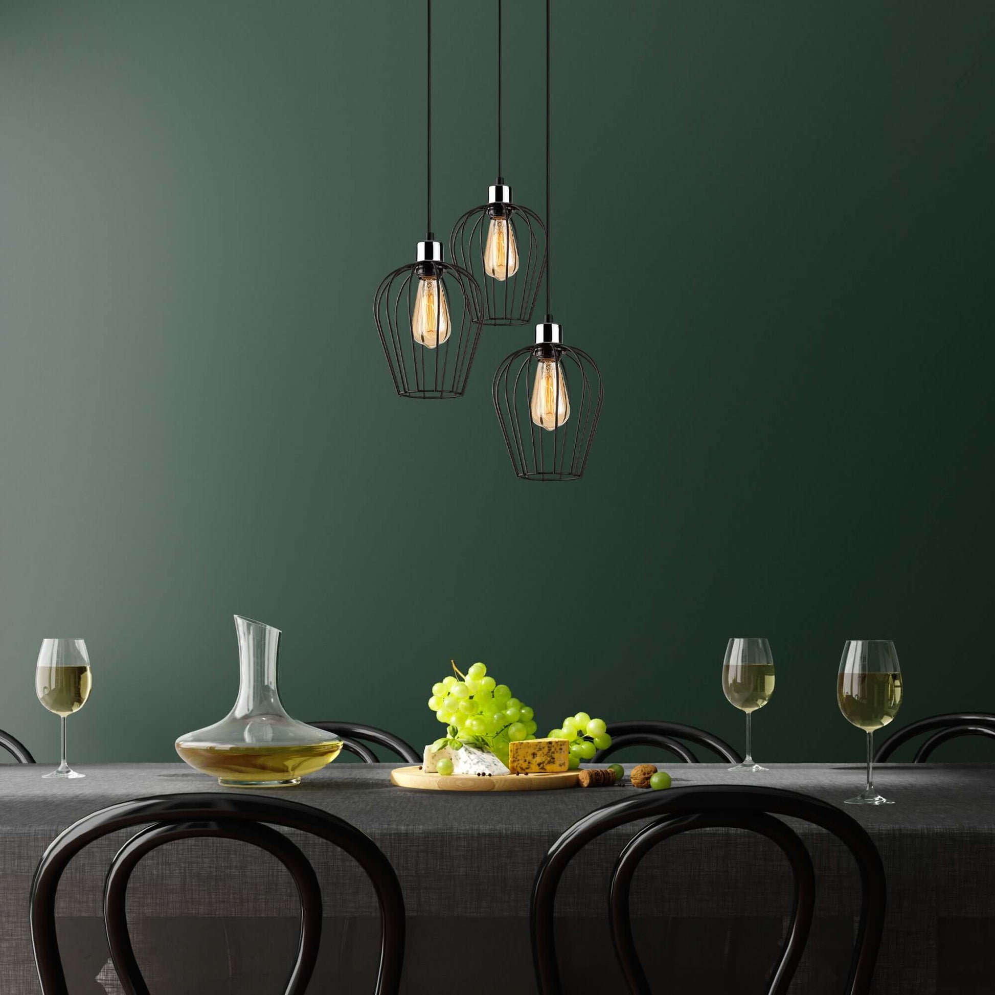 Cage Trio Pendant with three cage-like shades showcasing bulbs for modern industrial decor.