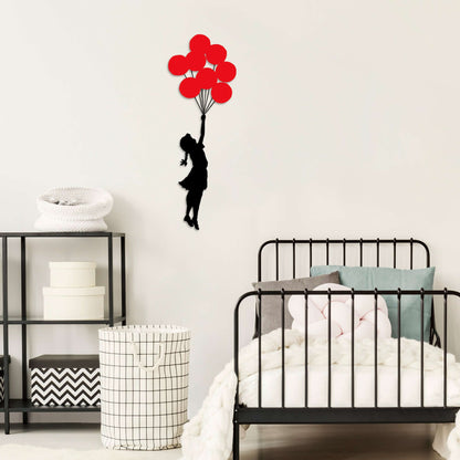 Dreamy Balloon Girl metal wall decor with girl soaring with red balloons.