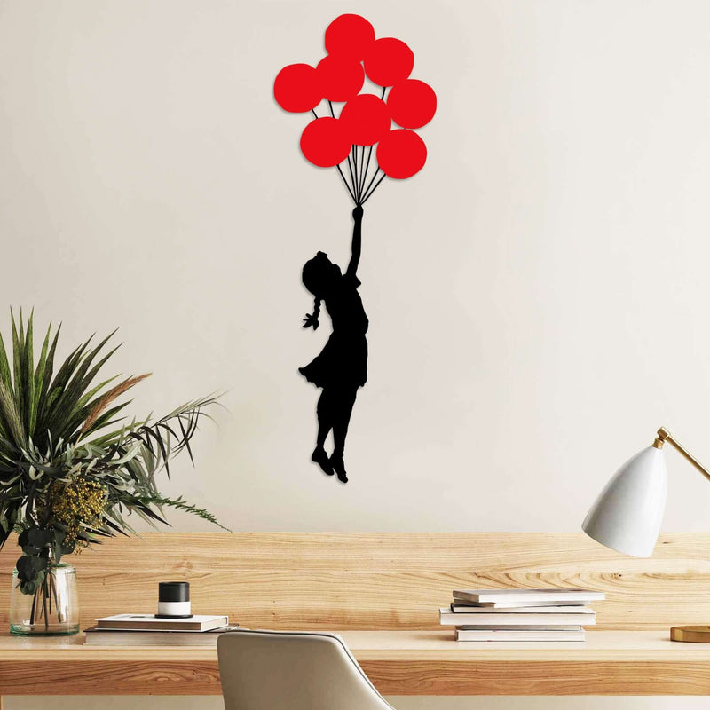 Dreamy Balloon Girl metal wall decor with girl soaring with red balloons.