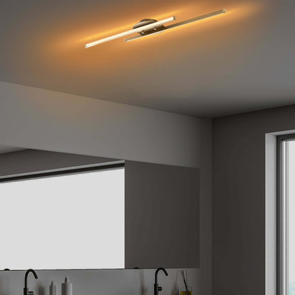 Dual beam ceiling light in elegant gold finish, illuminating a room with two beams of light.