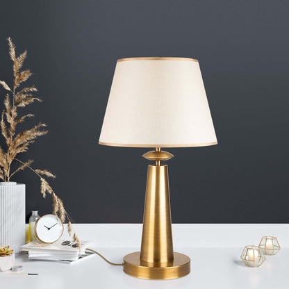 Eclipse Elegance gold desk lamp with tapered design.