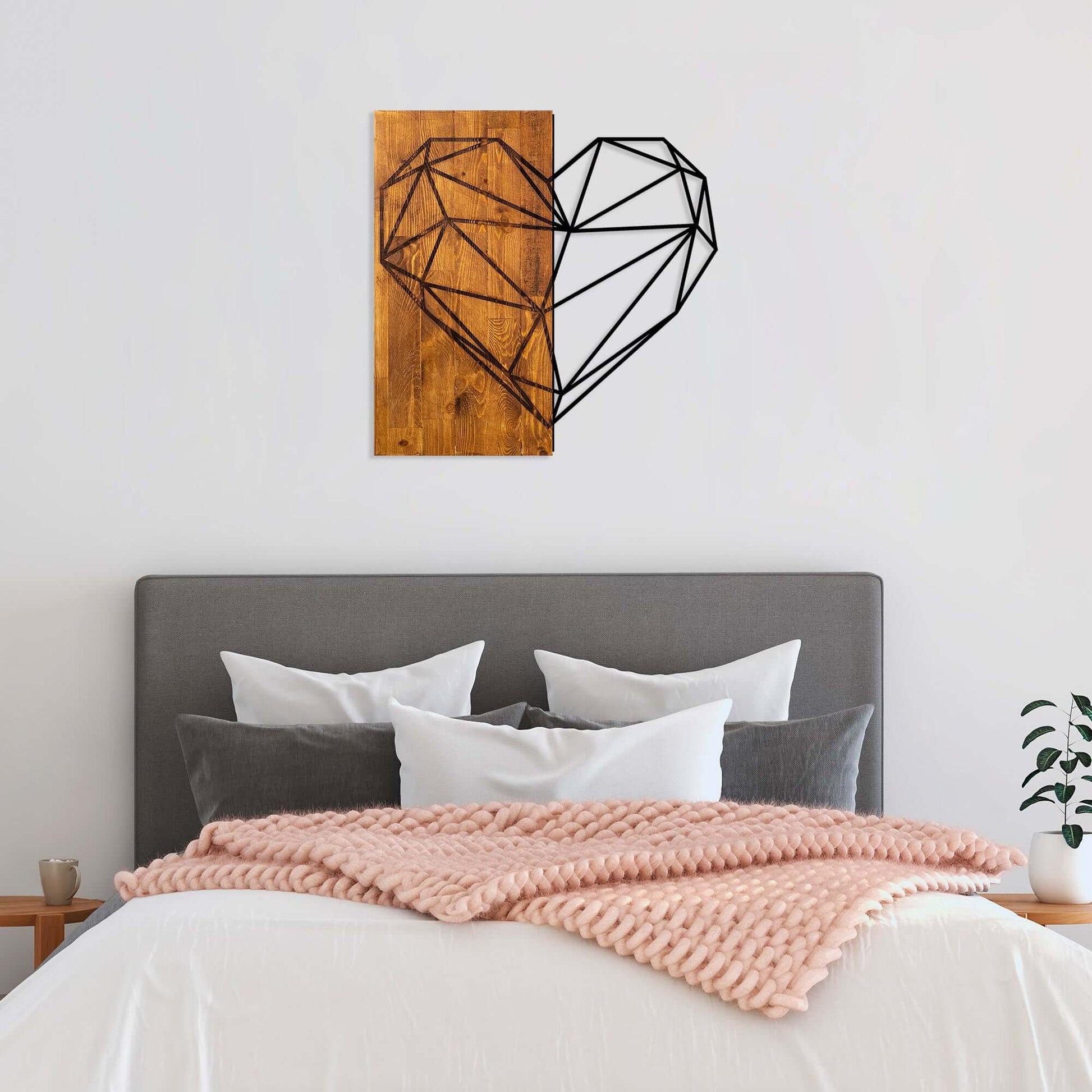 Geometric black lines forming a heart shape wall art piece.