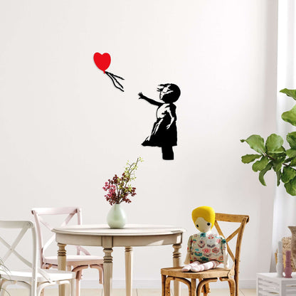 Heart's Freedom Wall Art: Metal wall decor with girl and balloon design.