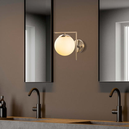 Horizon Globe Wall Sconce with Frosted Glass Globe and Brass Frame