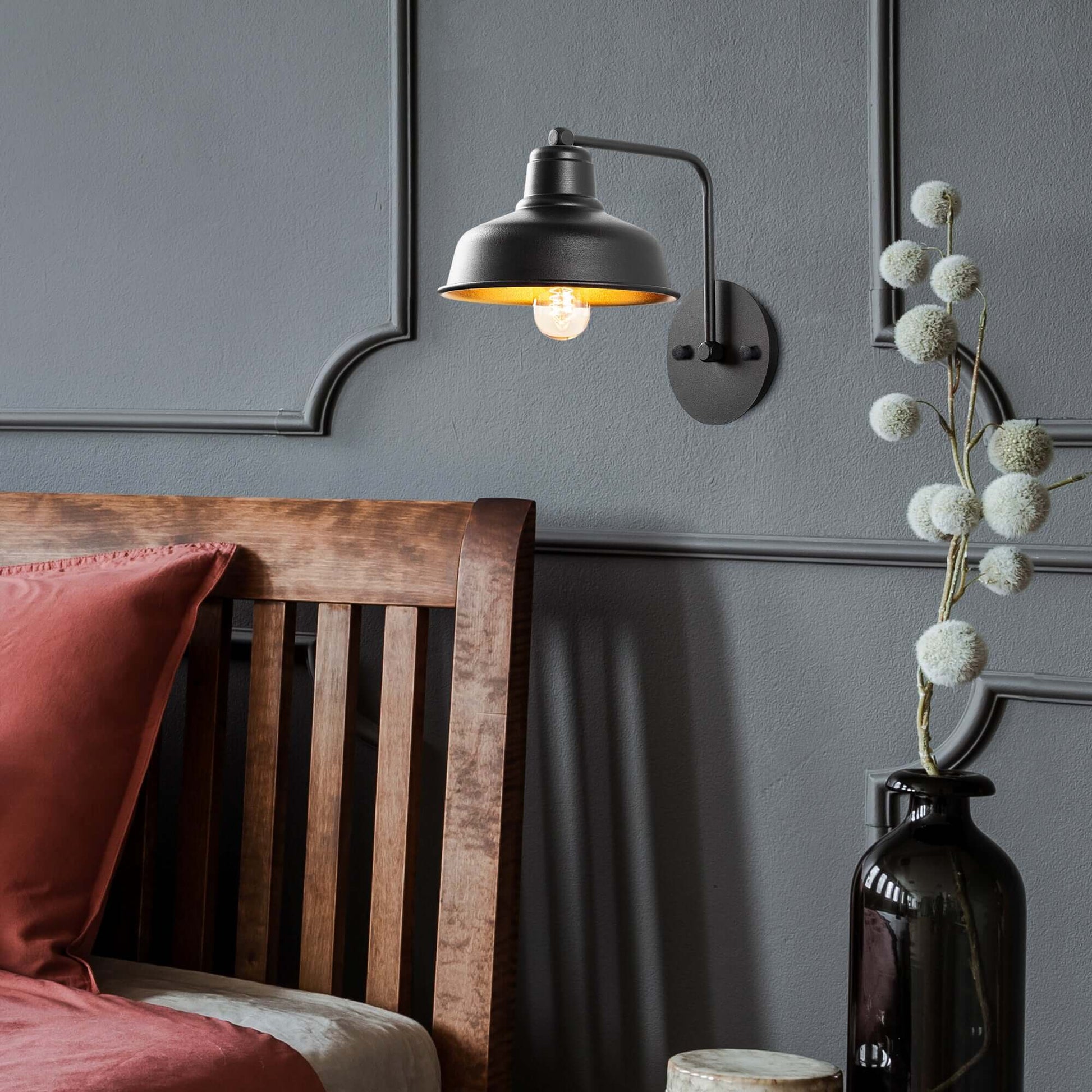 Industrial Charm Wall Light in black metal finish with gold interior, ideal for hallways, kitchens, or living spaces.