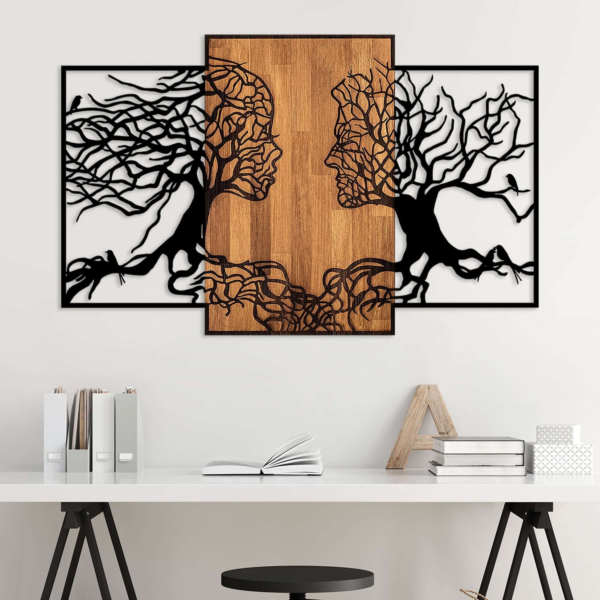 Lovers' Grove metal wall art with trees merging into faces, elegant metal and warm wood design.