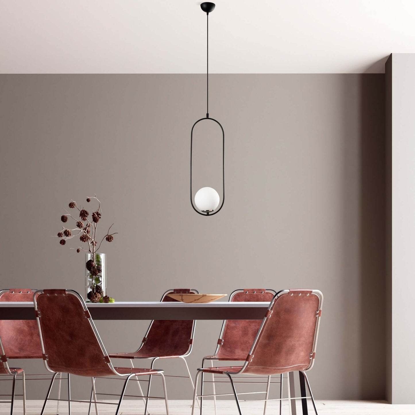 Luminous Pendant with open frame design and glowing orb, modern minimalist light fixture.