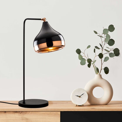 Midnight Gloss Desk Lamp in black and copper finish with curved design.