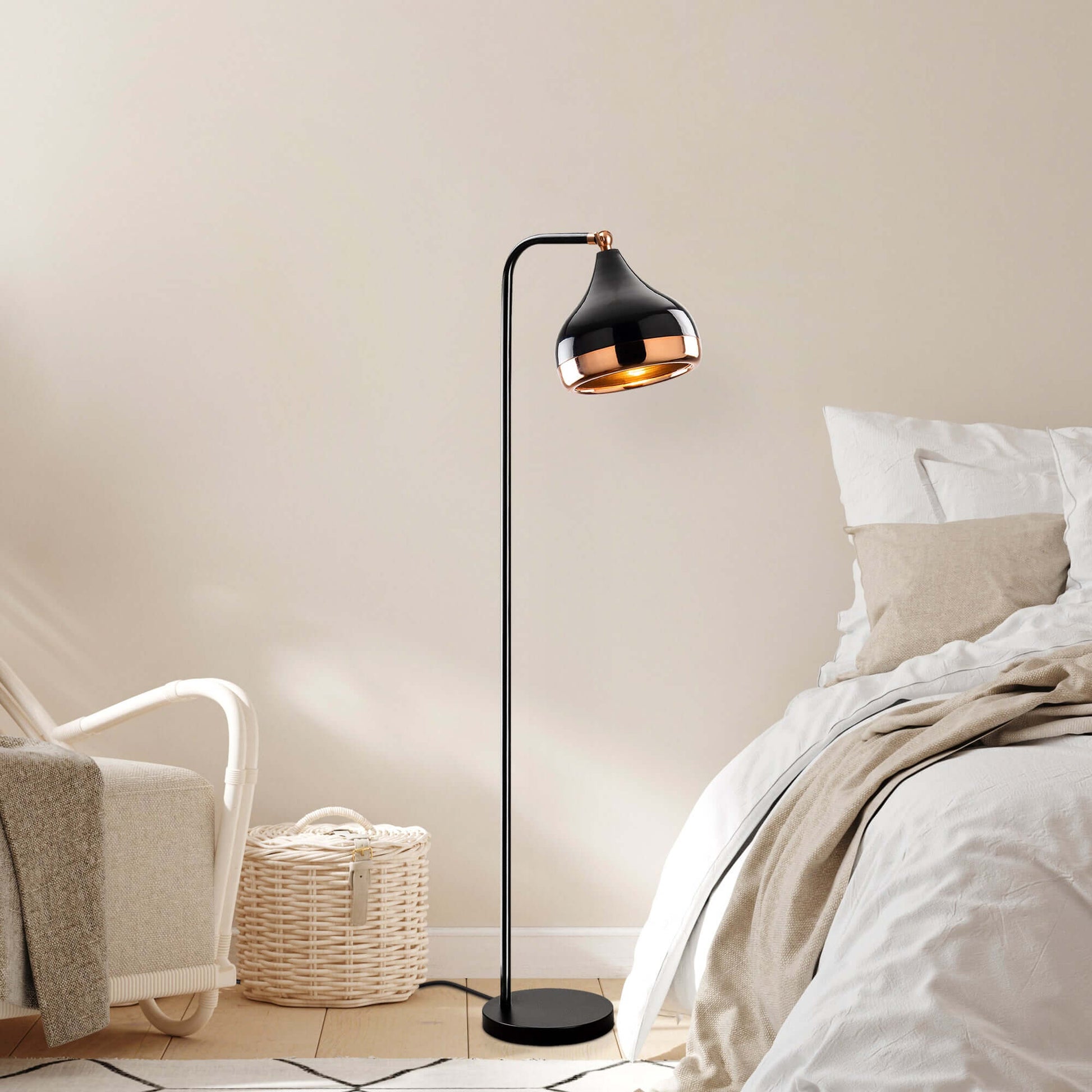 Midnight Gloss Floor Lamp in black and copper design emitting a sophisticated glow.