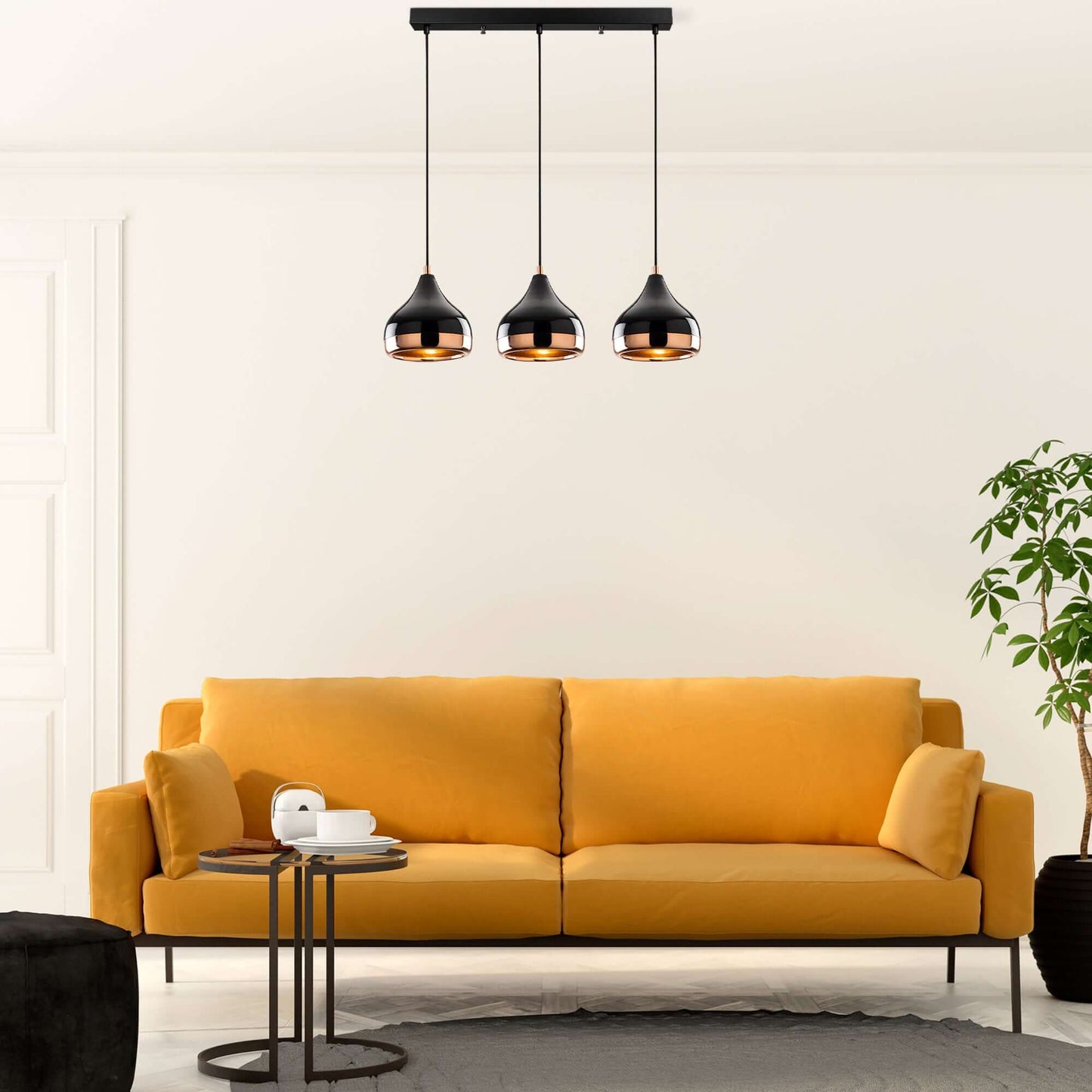 Midnight Gloss Pendant Horizon Trio with black and copper shades for striking visual appeal.