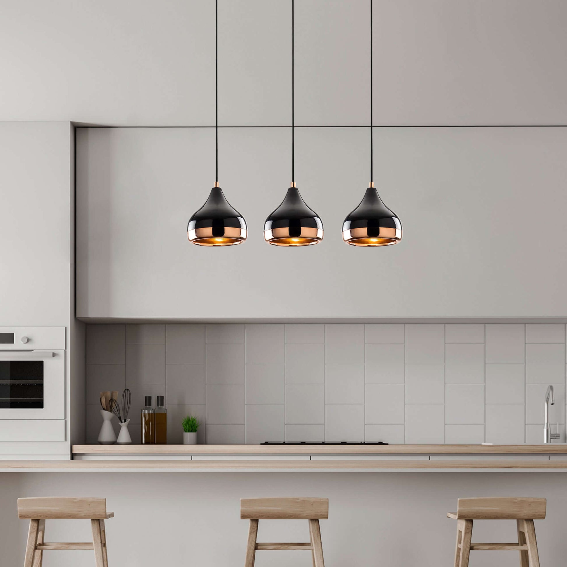 Midnight Gloss Pendant Horizon Trio with three black and copper shades.