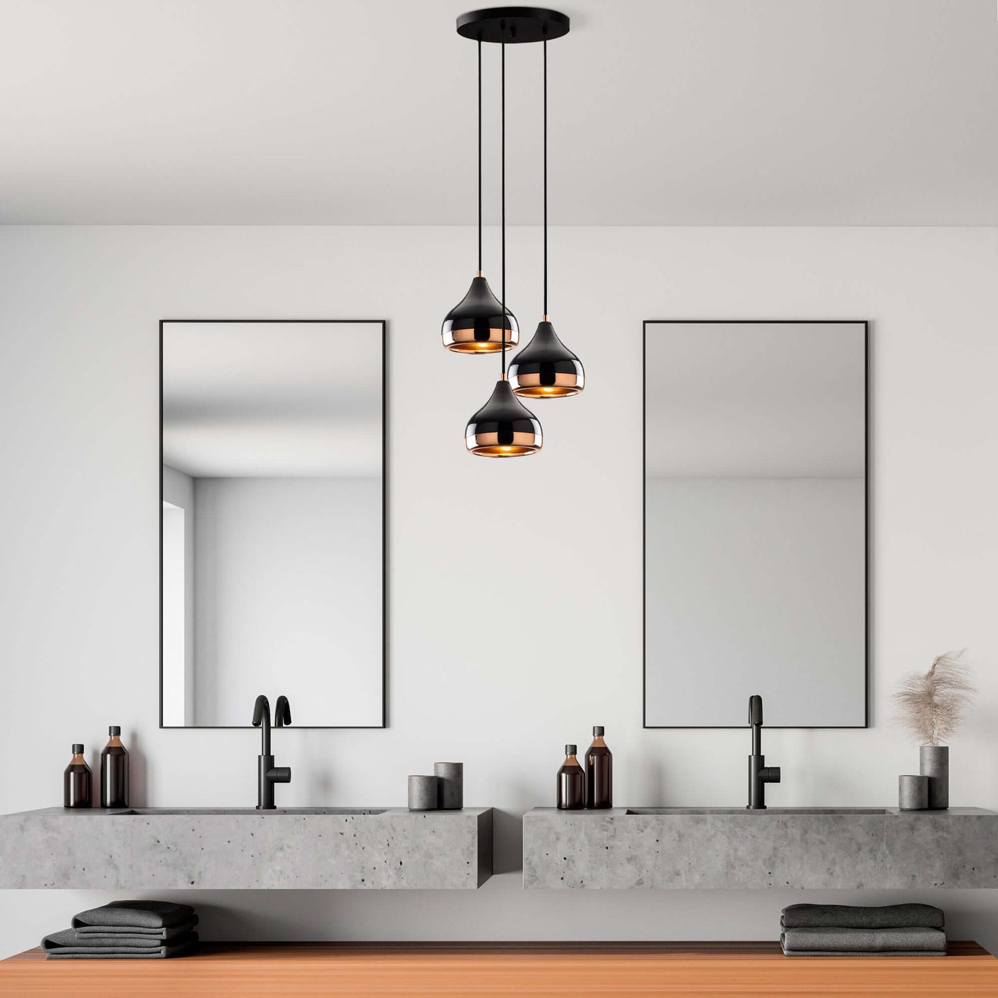 Midnight Gloss Pendant Trio Chandelier in black and copper finish.