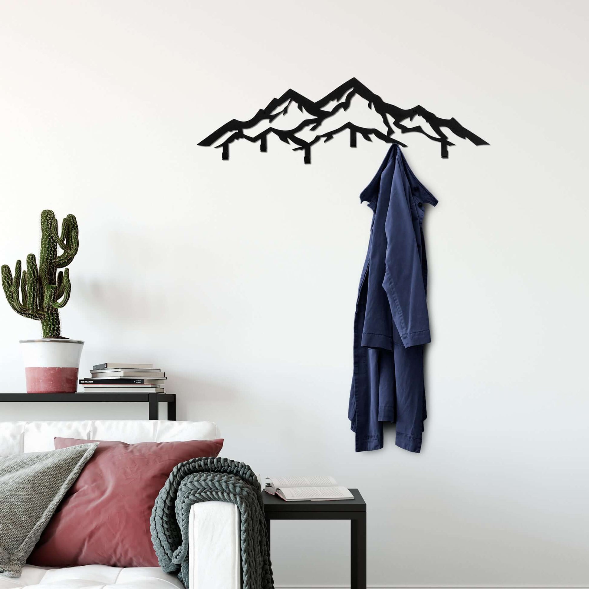 Mountain Peaks Coat Rack with black mountain silhouette design in durable metal.