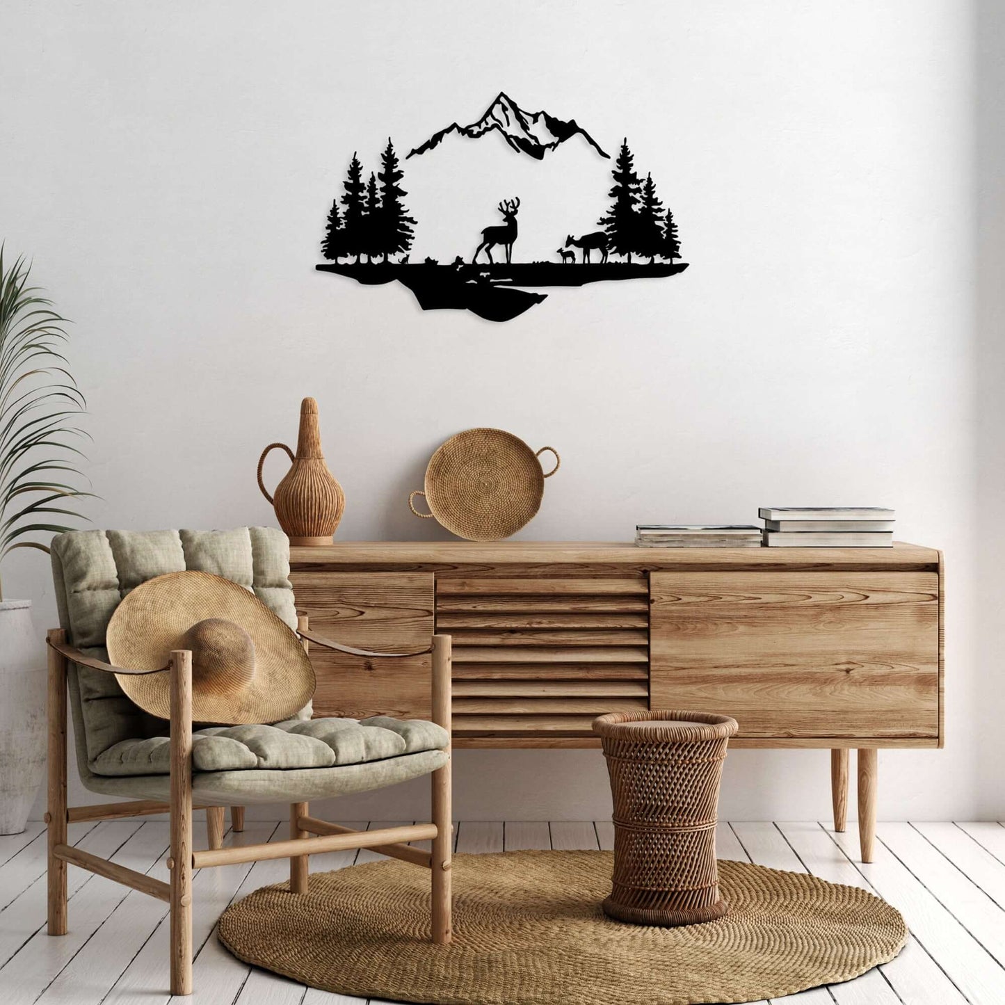 Metal wall decor with serene mountain wilderness silhouette, deer, and evergreen trees.