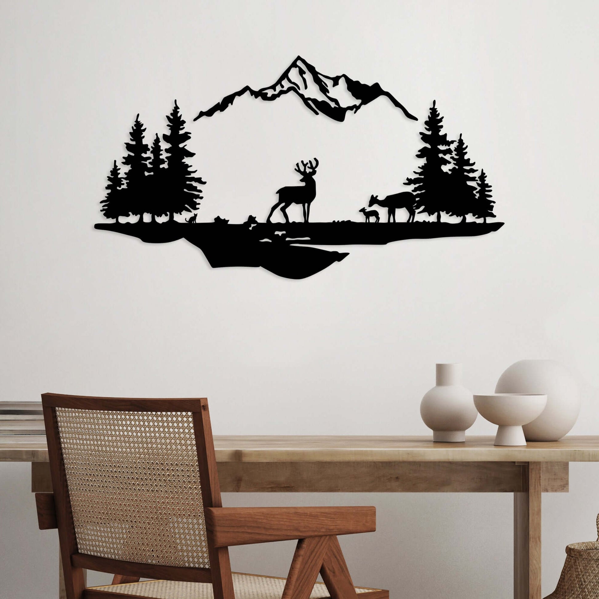 Metal wall decor featuring serene mountain wilderness silhouette with deer and evergreen trees.