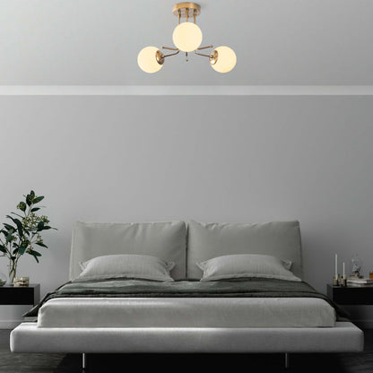 Orbital Brass Trio Chandelier with Three Sleek Globes