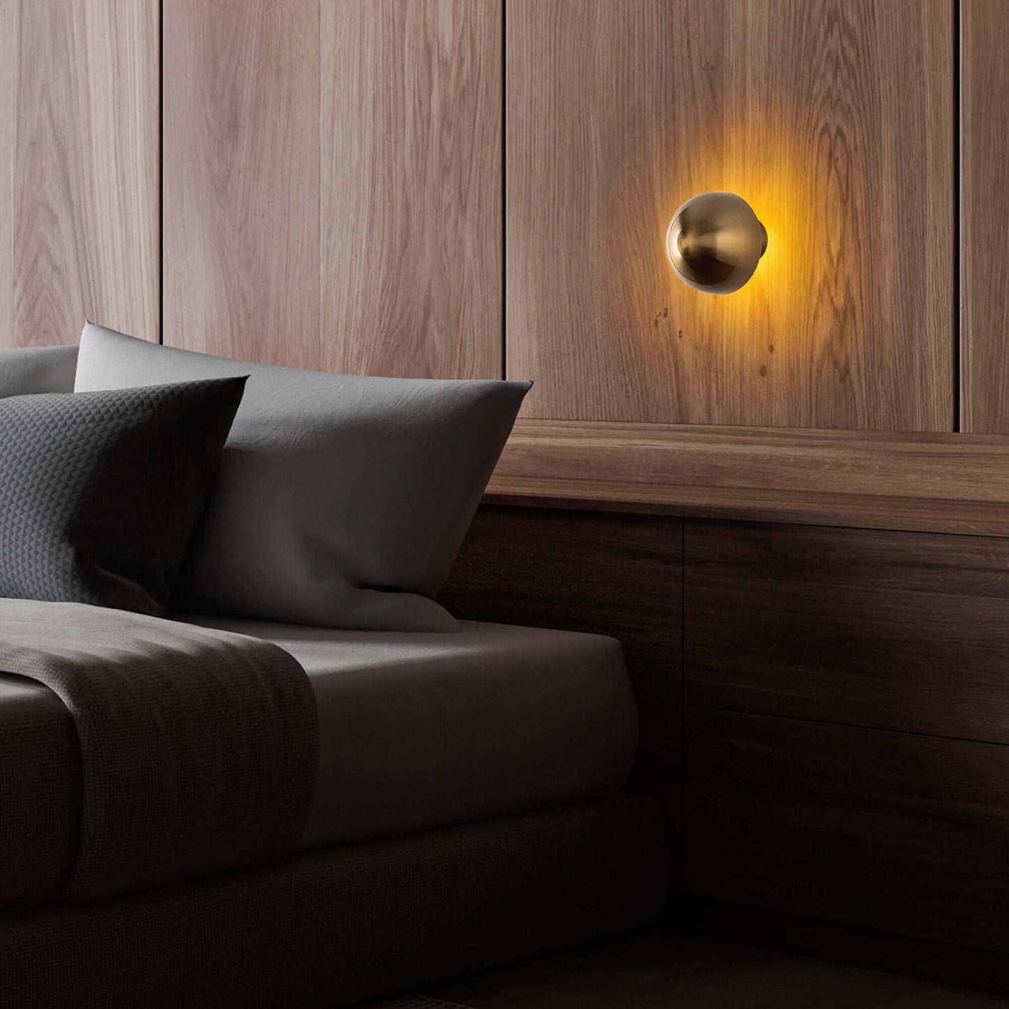 Radiant Sphere Wall Sconce in Brass Finish adding luxury to space.