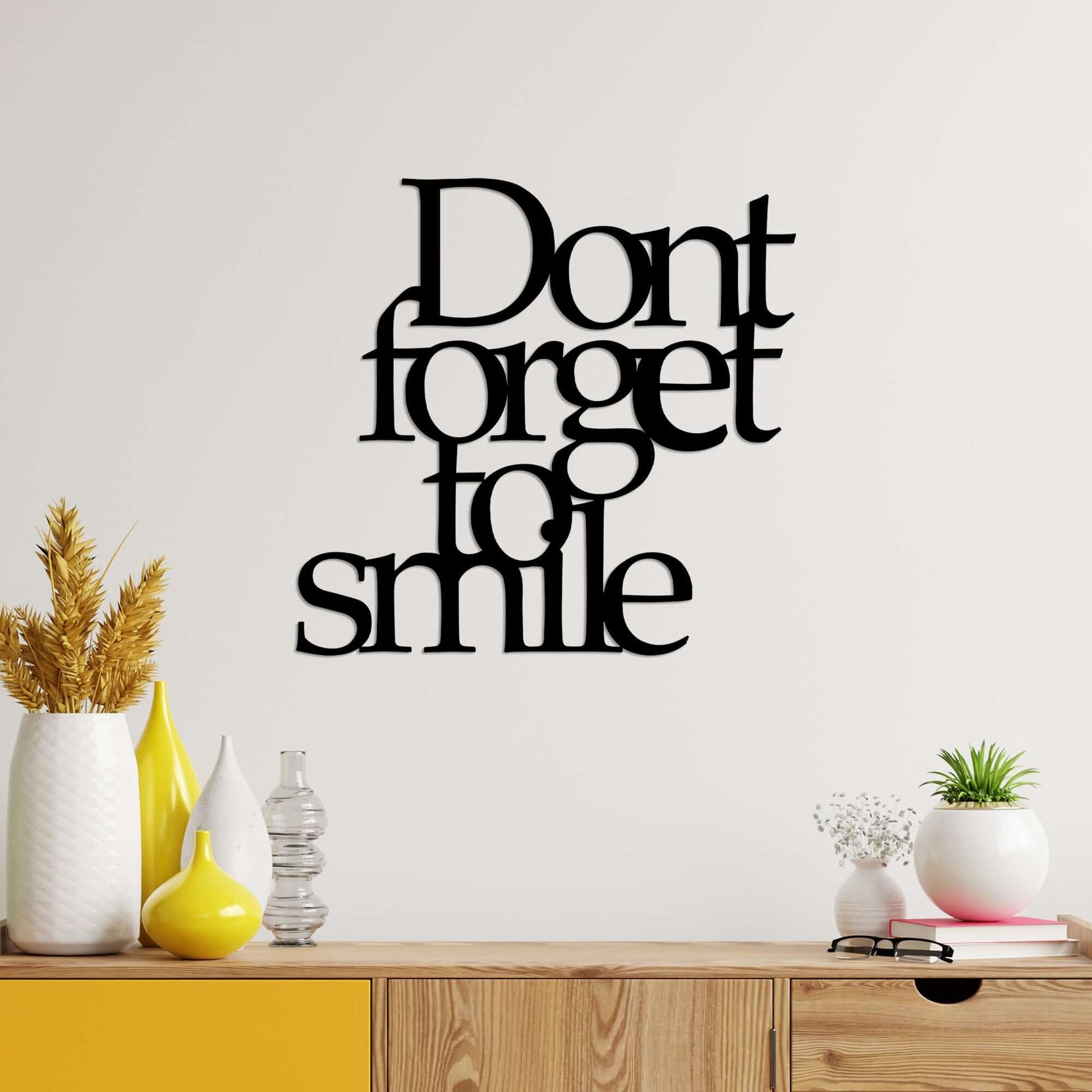 Smile Reminder Wall Art metal decor with "Don't Forget to Smile" phrase.