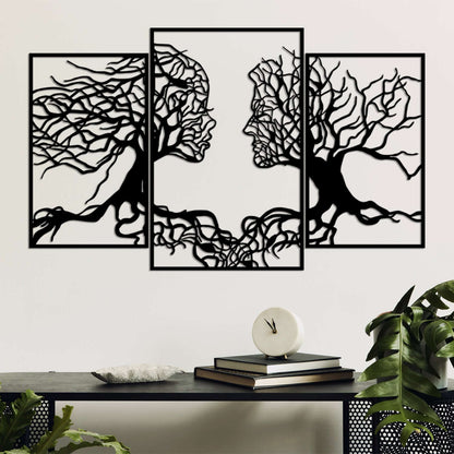 Metal wall decor featuring elegant tree branches forming human figures - Tree of Life Whisper.